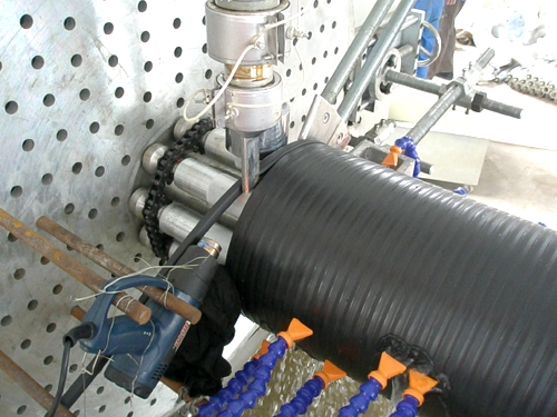 1467266816413466.jpg HDPE中空壁纏繞管設備.jpg